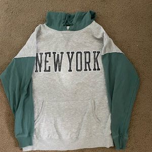 Hoodie with green sleeves